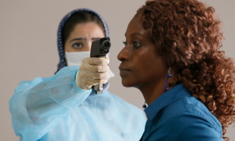 Screening a passenger at Mohammed V airport in Casablanca,. Photo: AP/Abdeljalil Bounhar