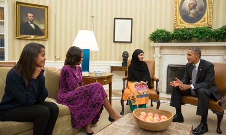 Malala talking to President Obama