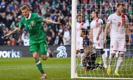 The Republic of Ireland's James McClean is flying with delight after scoring the fourth of the match.