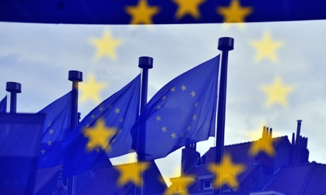 European flags are reflected at the entrance of the Berlaymont building EU Commission in Brussels.