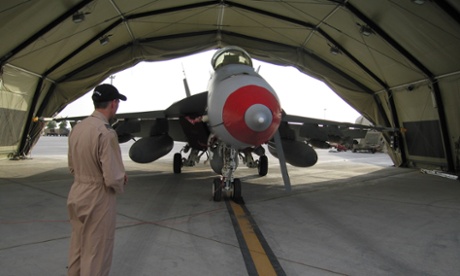 An RAAF Group Captain C with one of the six Super Hornets conducting missions over Iraq, Saturday, Oct. 11, 2014 . The aircraft carries of full load of external fuel tanks, smart bombs and air-to-air missiles plus 400 rounds of 20mm ammunition for its gun. It's housed in what's known as a 