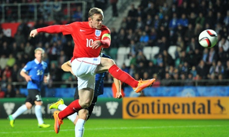 England's forward Wayne Rooney takes a shot at goal during the UEFA 2016 European Championship qualifying group E football match between England and Estonia in Tallinn, Estonia, on October 12, 2014.  AFP PHOTO / GLYN KIRKGLYN KIRK/AFP/Getty Images
