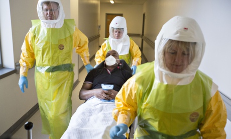 Ambulance and hospital staff take part in an exercise to test UK readiness for an Ebola outbreak
