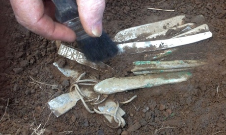 An archaeologist prepares the top level for removal  of items found at an undisclosed location in Dumfries and Galloway