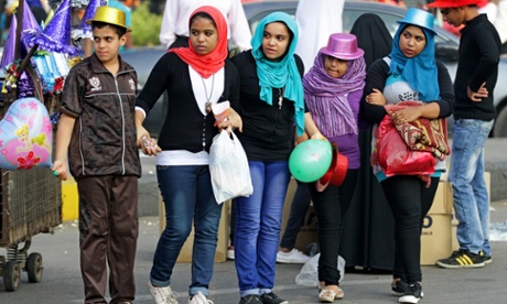 Egyptians celebrate after the early morning prayers marking Eid al-Adha