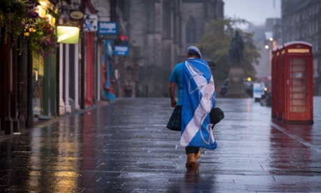 A dejected 'Yes' supporter in Edinburgh heading home after Scotland voted in September to reject independence. Following the vote, MPs are today discussing plans for further devolution for Scotland, and for England too.