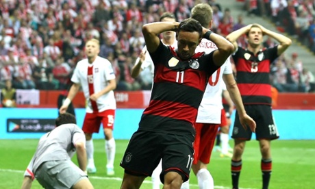 Karim Bellarabi of Germany reacts after missing  a good chance for scoring against Poland.
