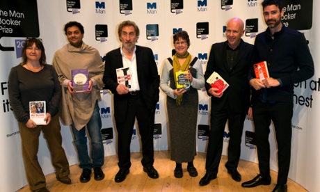 Nominees for the 2014 Man Booker prize for fiction, each holding their book.