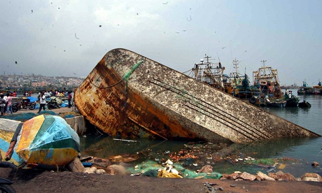 Cyclone Hudhud, a capsized boat in Visakhapatnam