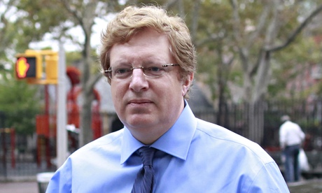 British financier Guy Hands in shirt and tie holding his jacket