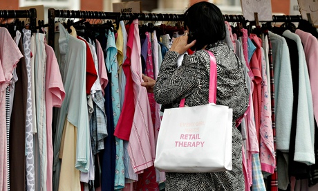 A shopper hunts for bargains at Bolton market. Rising food and energy bills had created a huge effec