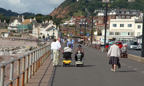 2 mobility scooters at seaside town
