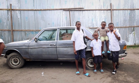 Young boys on the streets of Kinshasa – some say the city has never recovered from Mobutu's time in charge.
