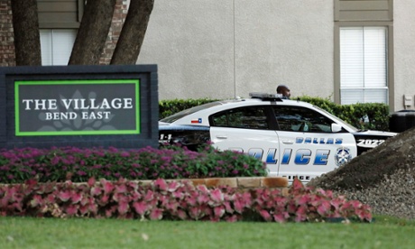 Dallas Police patrol the entrance to The Village Bend East apartments, home to the second healthcare worker who tested positive for Ebola.