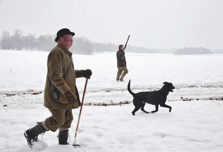 A woodcock shooting party in the snow at Holkham Hall