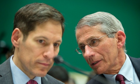 National Institute of Allergy and Infectious Diseases Director  Dr. Anthony Fauci, right, talks with CDC Director Dr. Tom Frieden.
