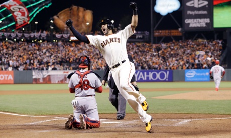 San Francisco Giants' Michael Morse reacts as he crosses home after hitting a home run during the eighth inning of Game 5 of the National League baseball championship series against the St. Louis Cardinals.
