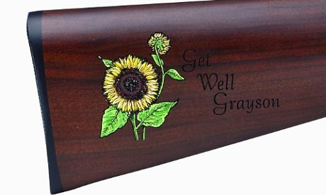 gun with engraving get well grayson on butt