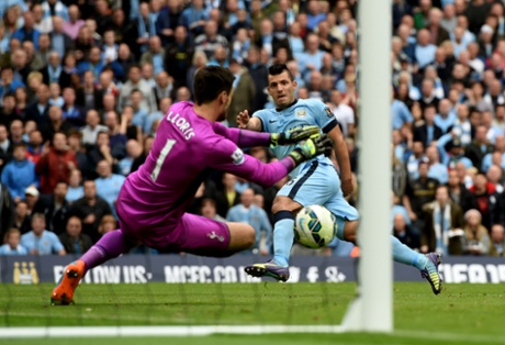 Hugo Lloris saves smartly from Sergio Aguero.