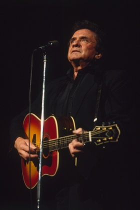 March 1989, Paris, France --- American country singer and songwriter Johnny Cash in concert at the Zenith, in Paris. --- Image by   Stephane Masson/Kipa/Corbisacoustic guitaradultAmericanCaucasian ethnicitycelebritiescomposerconcertcountry musicEuropeFranceguitar le-de-FranceJohnny Cashmalemenmiddle-agedmiddle-aged manmusicmusical instrumentmusical instrument playingmusical performancemusicianNorth Americanoneone personParispeopleperformanceperforming artsprominent personssingersongwriterstringed instrumentThe HighwaymenWestern Europe