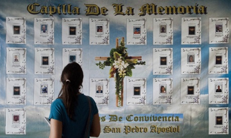A banner with pictures of victims of violence in Buenaventura