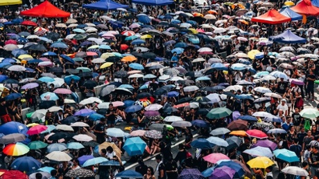 Umbrella Revolution, 3pm: 'Protestors open their umbrellas at exactly the same time at 3pm, to the raucous sound of applause.'