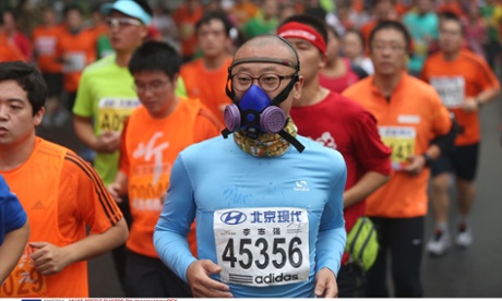 Many runners wore face masks to protect themselves against the 