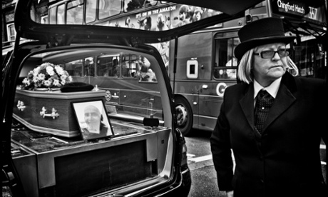 Doc's coffin and portrait. Photograph: Sarah Lee for the Guardian