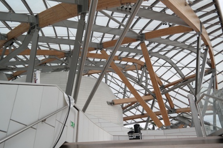 Cat's cradle … the sails are held up by a complex nest of steel columns and timber beams.