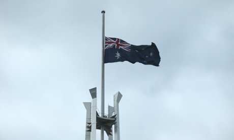 The flag on top of Parliament House flies at half mast to mark the passing of Gough Whitlam this morning, Tuesday 21st  October 2014.