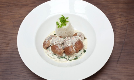 Five veal kidneys around a tower of rice at Brasserie Gustave