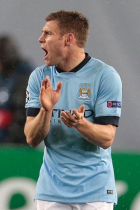 James Milner celebrates after doubling City's lead