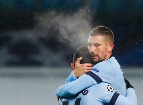 Then gets a congratulatory hug from team-mate Aleksandar Kolarov