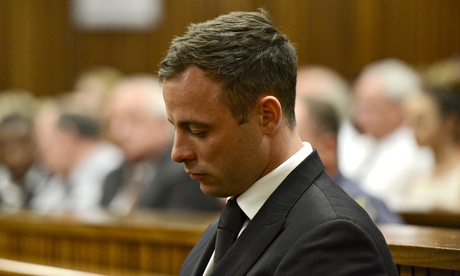 Oscar Pistorius listens to his judgment in the Pretoria high court