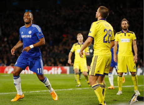 A smile from Didier Drogba and a glare from a team-mate as Mitja Viler scores an own goal