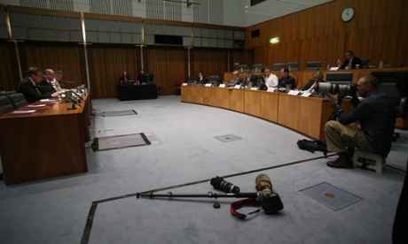 Don't step outside the lines-The photography and camera pen at the Senate Foreign Affairs, Defence and Trade Committee in Parliament House this morning, Wednesday 22nd October 2014.