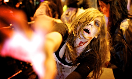 A woman dressed as a zombie