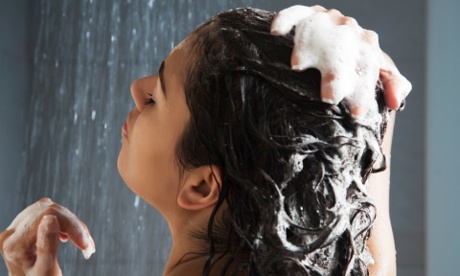 a woman taking a shower