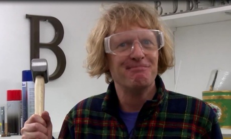 Grayson Perry prepares to take a hammer to the Huhne vase
