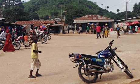 MDG : Economic impact of ebola crisis in Liberia : A boy in a marketplace in Kolahun