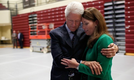 Bill Clinton and Alison Lundergan Grimes share a moment backstage.
