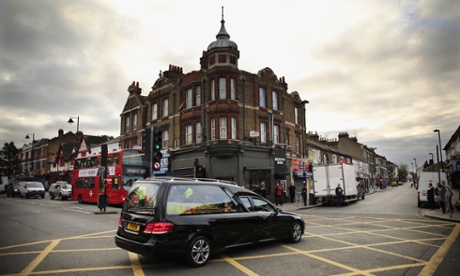 The funeral cortege for murdered teenager Alice Gross drives through Hanwell town centre.