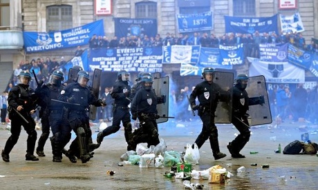 French riot police run charge at Everton fans