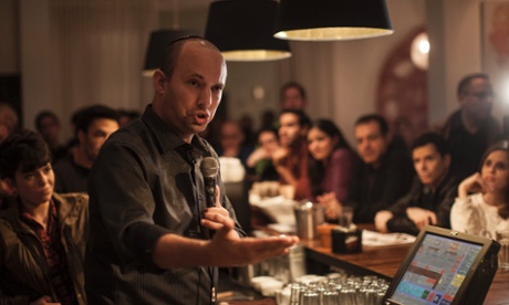 Naftali Bennett speaking in a bar in 2012