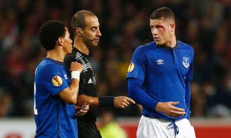 Ross Barkley complains to referee Manuel de Sousa after being cut above his eye.