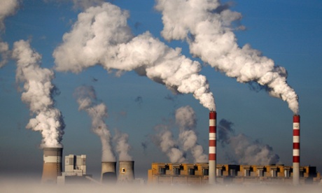 Smoke billows from the chimneys of a coal-fired Polish power plant.