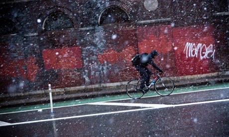 Cyclist on wintery street.