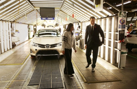 Chancellor of the Exchequer George Osborne meets with employee uring a visit to a Toyota plant on October 24, 2014 in Derby, England.