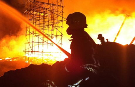 A firefighter combatting the blaze at a multi-million pound University of Nottingham chemistry building. Photo: Press Association