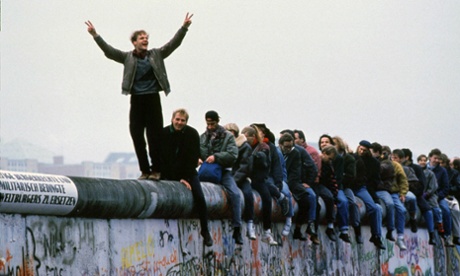 Berliners celebrate the fall of the Berlin Wall in November 1989